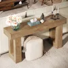 A console table with decorative items and a stool in a living room setting. Náhľad obrázku produktu