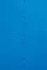 A close-up view of interlocking blue foam mats. Produktbild-Vorschau