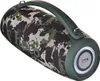 A camouflage-patterned portable speaker with a green handle, set against a white background. Náhľad obrázku produktu