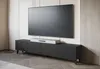 A modern living room with a TV stand and a large television. Náhled obrázku produktu