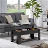 A living room scene with a couch and a coffee table. Produktbild-Vorschau