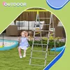 A young girl is swinging on a swing set in a backyard, with a patio and furniture in the background. Produktbild-Vorschau