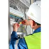 An electrician working on a control panel. Náhľad obrázku produktu