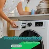 A person is shown using a washing machine, with laundry detergent bottles and towels in the background. Produktbild-Vorschau