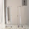 Two views of a white floor mirror with dimensions indicated by dotted lines and text. Podgląd zdjęcia produktu