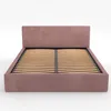 A pink upholstered bed frame with a slatted base, shown from the front on a white background. Náhľad obrázku produktu