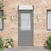 A gray door with a transparent canopy above it, set against a brick wall. Náhled obrázku produktu