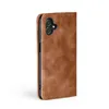 A brown flip cover phone case is shown from the side against a white background. Produktbild-Vorschau