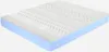 A mattress with a textured white top layer and a light blue base layer, shown from a diagonal angle against a white background. Produktbild-Vorschau