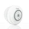 A white Bluetooth speaker with control buttons on a white background. Voir les images du produit