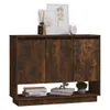 A wooden sideboard with three doors and an open shelf at the bottom, decorated with framed pictures, a diffuser, and a small clock on top, and books and a plant on the shelf. Náhled obrázku produktu