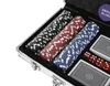 A poker set in an open aluminum case, showing poker chips, dice, and playing cards. Náhľad obrázku produktu