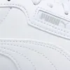 A close-up view of a white Puma sneaker, showing the brand logo and stitching details. Anteprima dell’immagine prodotto