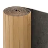 A rolled-up bamboo room divider on a white background. Anteprima dell’immagine prodotto