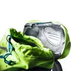 A close-up view of the inside of a green backpack, showing the drawstring closure and a name tag. Produktbild-Vorschau
