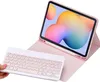 A pink tablet case with a keyboard is shown against a white background. Náhľad obrázku produktu