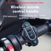 A close-up of a wireless remote control handle attached to a motorcycle handlebar. Produktbild-Vorschau