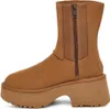 A side view of a brown UGG boot with a platform sole. Produktbild-Vorschau