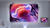 A projector displaying a jellyfish image on a wall, with a smaller inset image of the same jellyfish. Produktbild-Vorschau