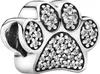 A close-up studio shot of a silver paw print charm with clear stones. Produktbild-Vorschau