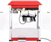 A front view of a red and silver popcorn machine with its doors open. Voir les images du produit