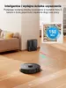 A robot vacuum cleaner is shown on a wooden floor next to its charging dock. An overlay shows a map with a cleaning path and battery indicator. Podgląd zdjęcia produktu