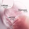 Close-up of a clear liquid with bubbles, with text annotations pointing to different ingredients. Produktbild-Vorschau