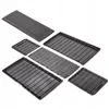 Several dark brown plastic storage boxes of various sizes are arranged on a white background. Podgląd zdjęcia produktu