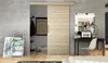 A modern bedroom with a sliding door, desk, and bed.