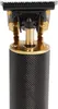 Close-up of the top part of a black and gold hair trimmer. Náhled obrázku produktu