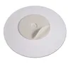A round, white cosmetic mirror with a peel-off backing in the center. Náhľad obrázku produktu