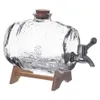 A clear glass barrel-shaped beverage dispenser with a metal spigot and a wooden stand. Produktbild-Vorschau