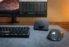 A computer setup with a monitor displaying audio software, a keyboard, a mouse, and an audio interface. Produktbild-Vorschau