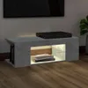 A modern TV stand with LED lighting, displaying books and a black electronic device. Anteprima dell’immagine prodotto