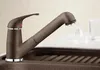 A close-up shot of a modern kitchen faucet. Produktbild-Vorschau