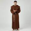 A man wearing a monk costume holding a book. Náhled obrázku produktu