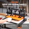 A person's hand wearing a white glove is operating a leather stamping machine. The machine is black and orange with silver metal components. Text overlays highlight the product's features and capacity. Anteprima dell’immagine prodotto