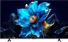A television displaying a vibrant, abstract image of a blue flower with golden accents against a dark, rocky background. Produktbild-Vorschau