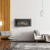 A modern living room with a fireplace, sofa, and chair. Náhled obrázku produktu