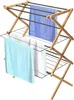 A wooden drying rack with towels hanging on it. Podgląd zdjęcia produktu