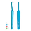 Two blue interdental brushes are shown against a white background, with four colored dots representing other available colors. Produktbild-Vorschau