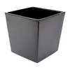 A black square planter pot with a slightly tapered shape, shown from a three-quarter angle against a white background. Anteprima dell’immagine prodotto