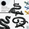 A collage of images showcasing a black 3D printed dragon figurine in various poses, with smaller images of similarly designed dragons in different colors. Produktbild-Vorschau