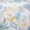 A close-up view of a floral pattern on fabric. Náhľad obrázku produktu
