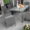 An outdoor dining set with chairs and a table on a wooden deck. Náhľad obrázku produktu