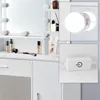 A collage of images showing a white vanity table with makeup and accessories, and close-ups of its LED light and power switch. Náhľad obrázku produktu