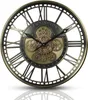 A close-up studio shot of a decorative wall clock with Roman numerals and visible gears. Produktbild-Vorschau