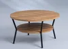A round, two-tiered coffee table with a wood-look top and black metal legs, set against a light gray background with subtle shadows. Produktbild-Vorschau