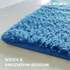 Close-up of a blue fluffy rug. Anteprima dell’immagine prodotto