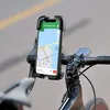 A smartphone mounted on a bicycle handlebar, displaying a navigation app. Produktbild-Vorschau